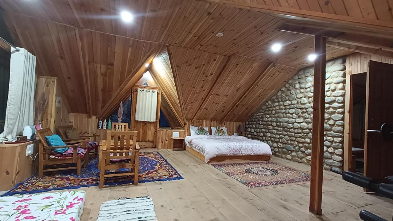 Ishan Log Huts-A Boutique Home Stay Banjār Esterno foto