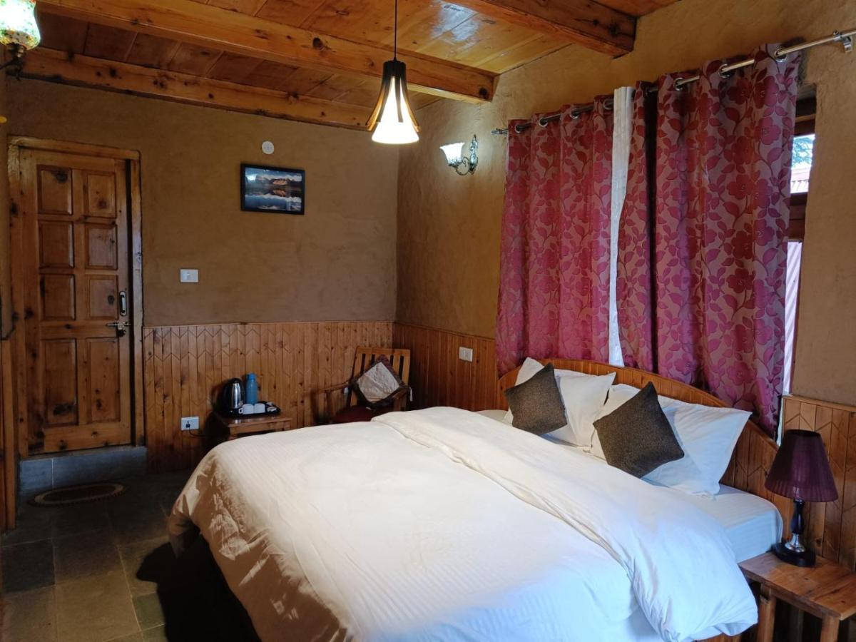 Ishan Log Huts-A Boutique Home Stay Banjār Esterno foto