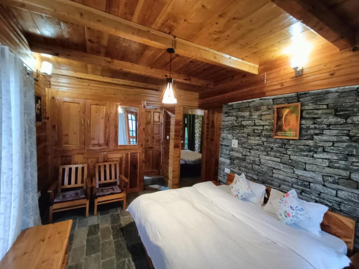 Ishan Log Huts-A Boutique Home Stay Banjār Esterno foto