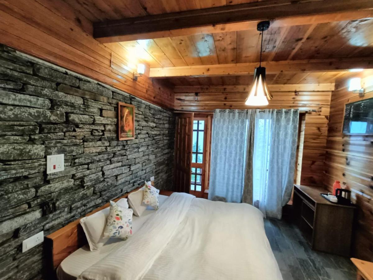 Ishan Log Huts-A Boutique Home Stay Banjār Esterno foto