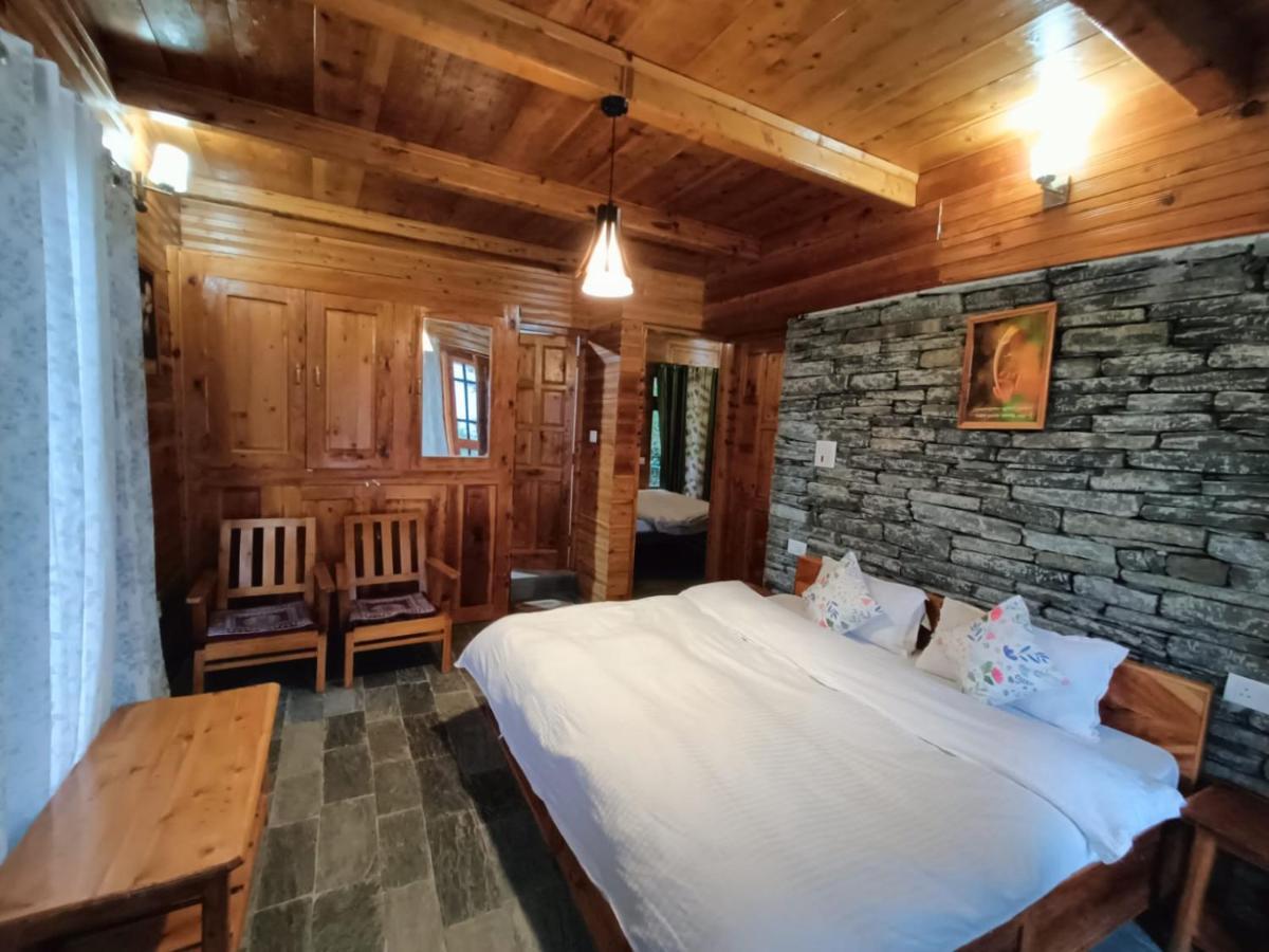 Ishan Log Huts-A Boutique Home Stay Banjār Esterno foto