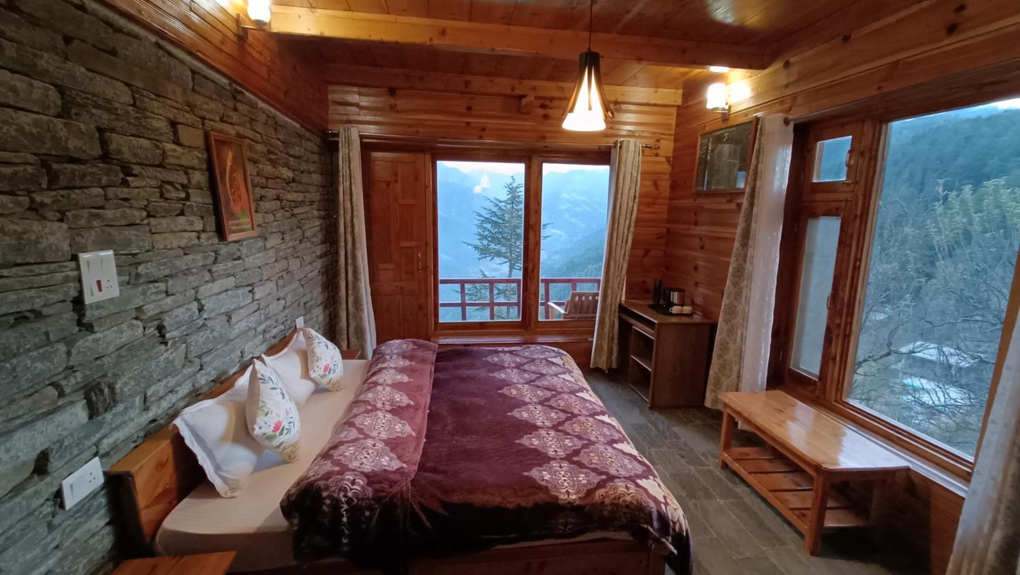 Ishan Log Huts-A Boutique Home Stay Banjār Esterno foto