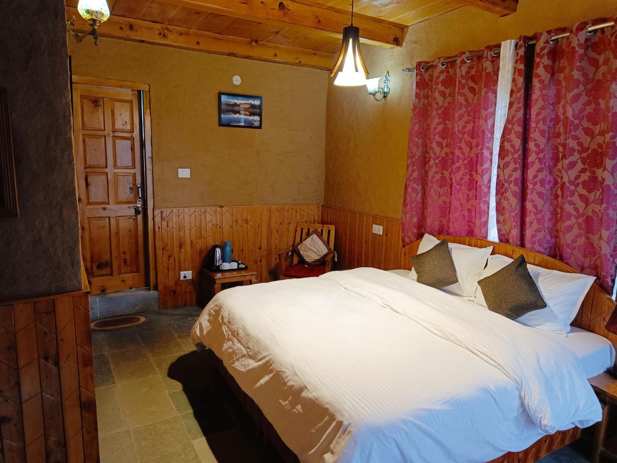 Ishan Log Huts-A Boutique Home Stay Banjār Esterno foto