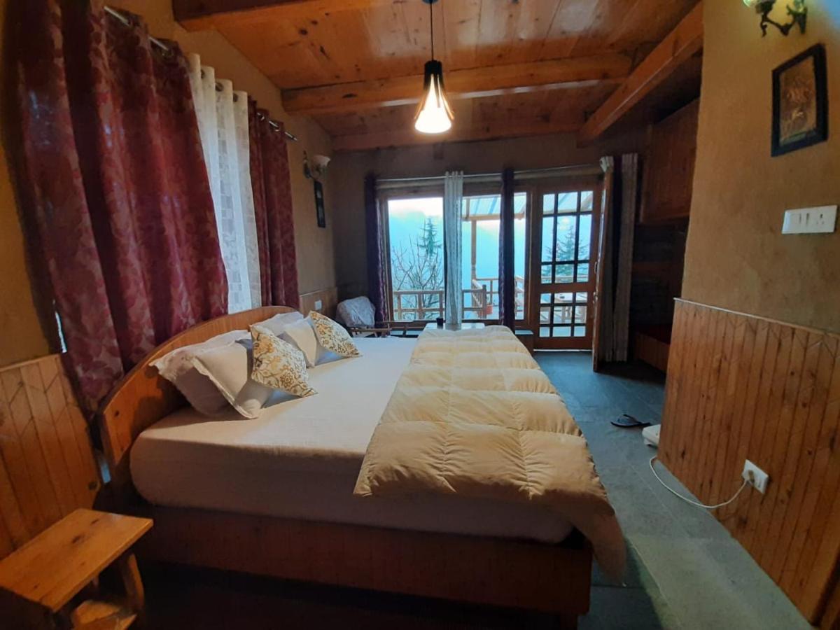 Ishan Log Huts-A Boutique Home Stay Banjār Esterno foto